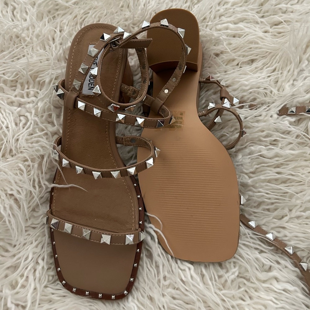 Studded ankle wrap sandals.